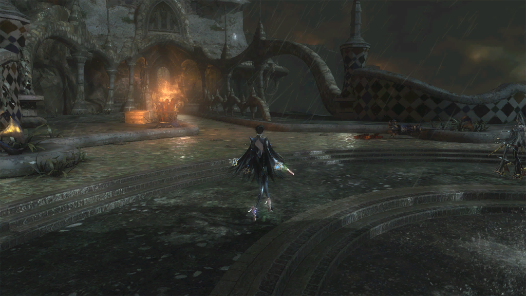 The camera is zoomed out, and the angle is shifted to the right. Rosa is farther away from Bayonetta.
