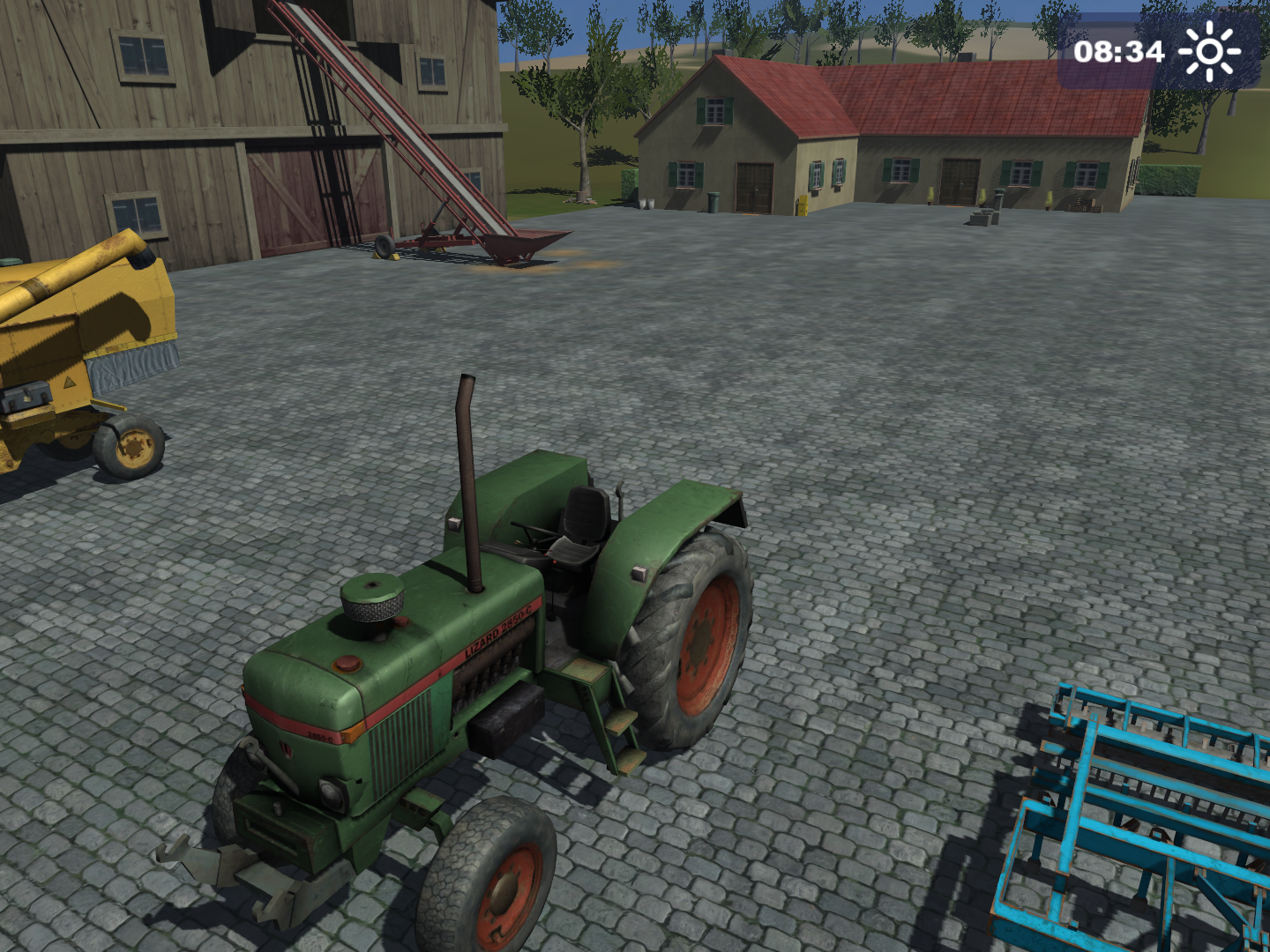 After going through the first two camera views, the game will then scroll through every camera view present in the loaded vehicles. Pictured above is the tipping camera on the Lizard 2850 tractor, which can normally only be activated while a tractor is unloading a trailer.