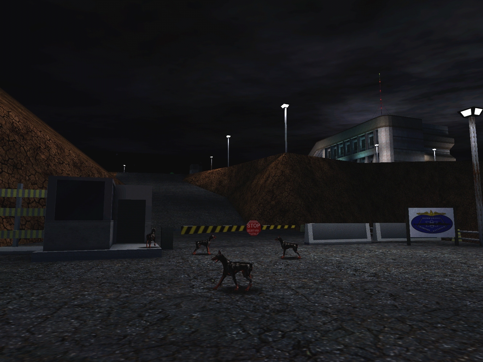 Vandenberg entrance with dogs. The large wall is missing and the Brooklyn submarine pen graphics are used on a sign.