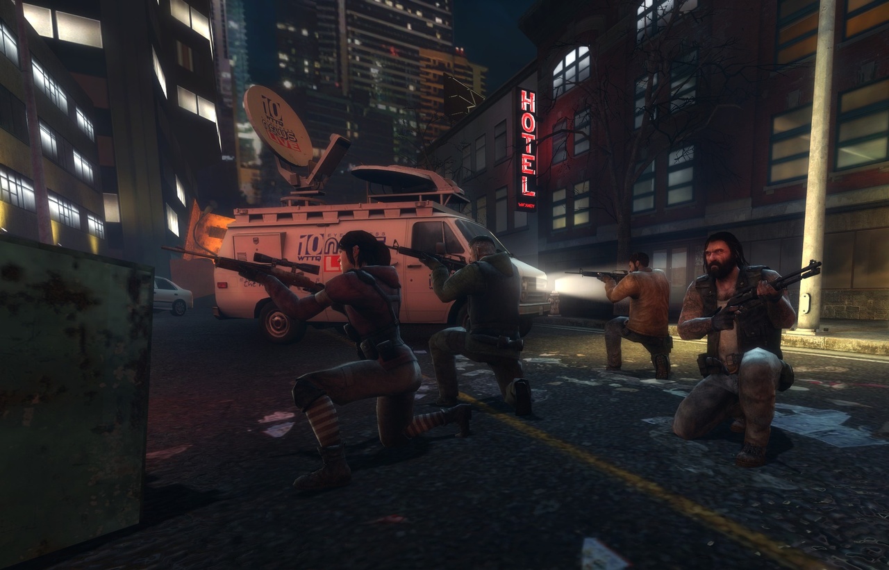 The survivors near a news van.