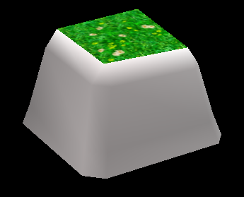 An unused small brown rock object with grass with flowers on top. A duplicate of it exists in the data.