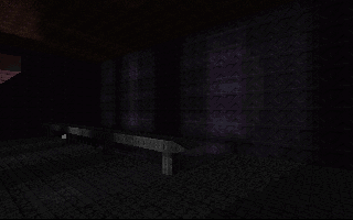 A downwards ramp that leads to various rooms.