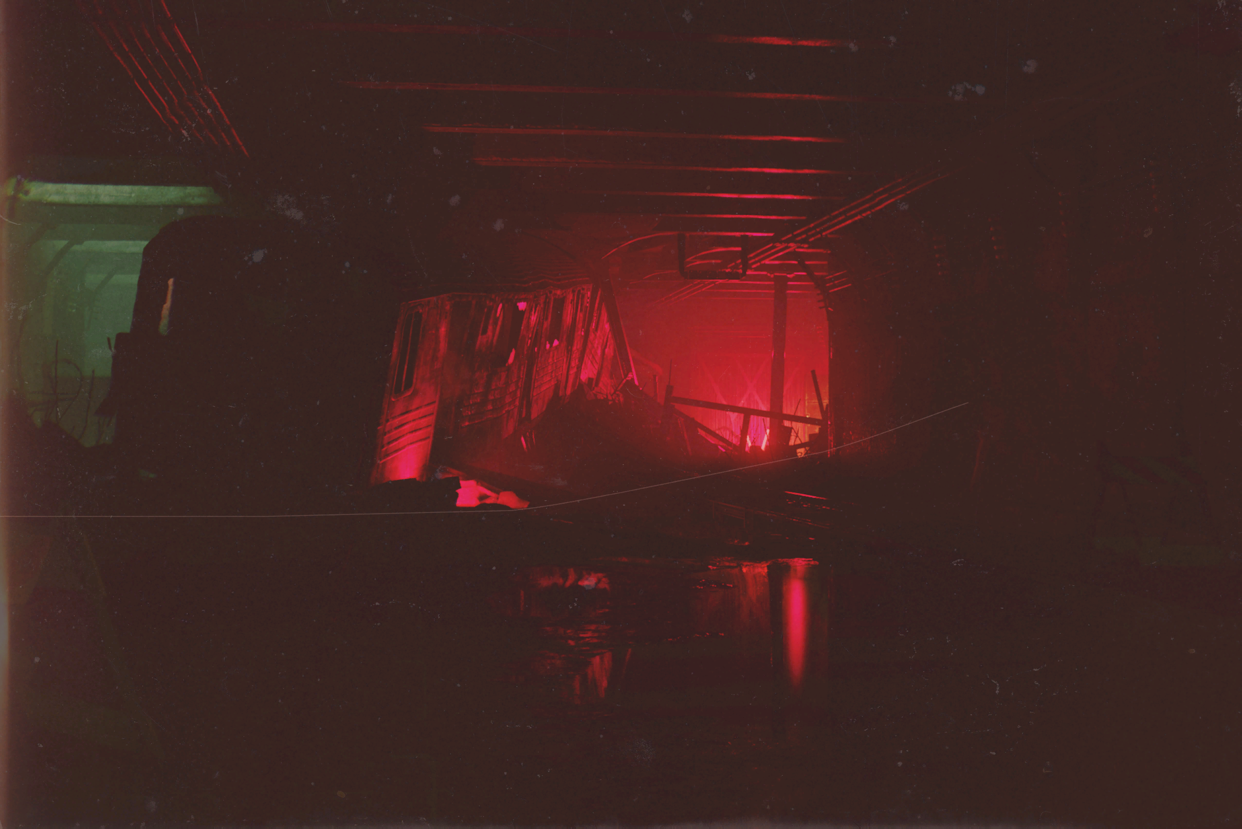 AlanWake2_scene_derailed_train--homeless_active_aout.png