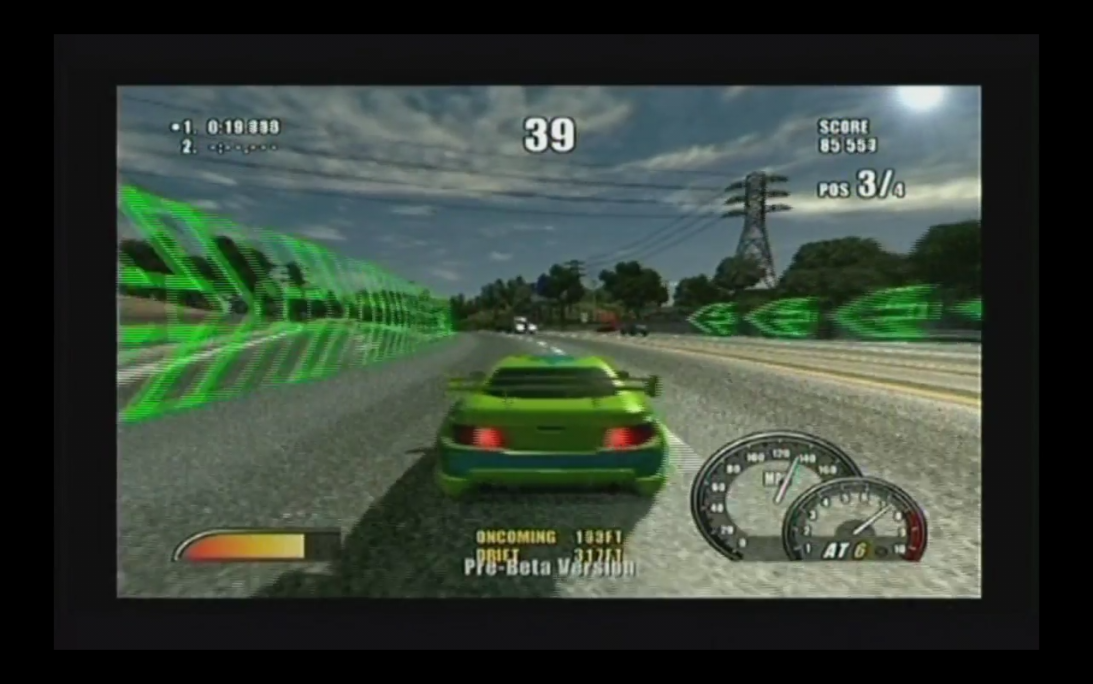 A screenshot of an early version of Burnout 2 with the green arrows from Burnout.