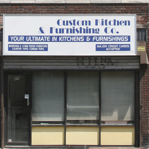 Unused "Custom Kitchen & Furnishing Co." sign in Westdyke.