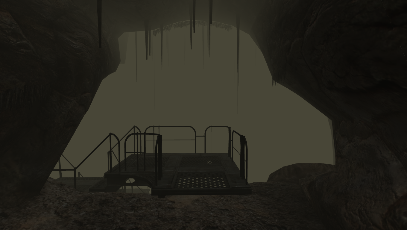 A spacious but empty cave area.