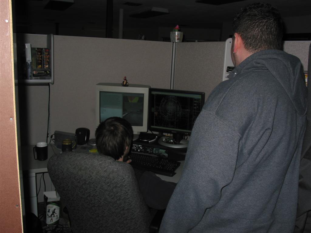 Here is scripter Mike Flynn showing level designer Jason O'Connell a bug with one of the maps.