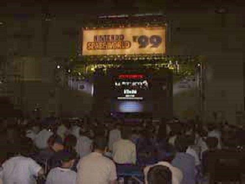 From 1101.com. The crowd gathers as they play the MOTHER 3 trailer on the big screen!