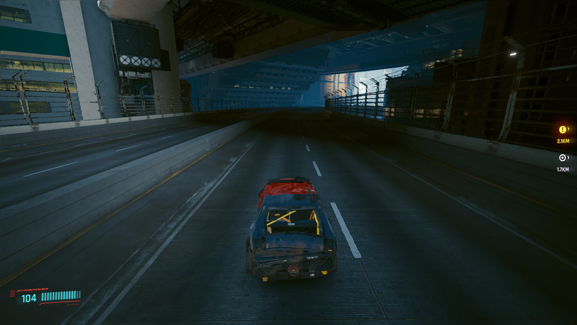 Keeping right, the road loops underneath buildings and lets you out on the border with Wellsprings Keeping right, the road loops underneath buildings and lets you out on the border with Wellsprings