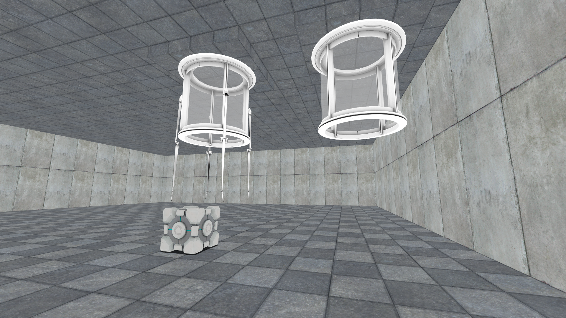 Two cube droppers, one of which with dangling limbs, and a cube to mess with said dangling limbs.