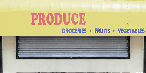 Unused "Produce" shop sign in Westdyke.