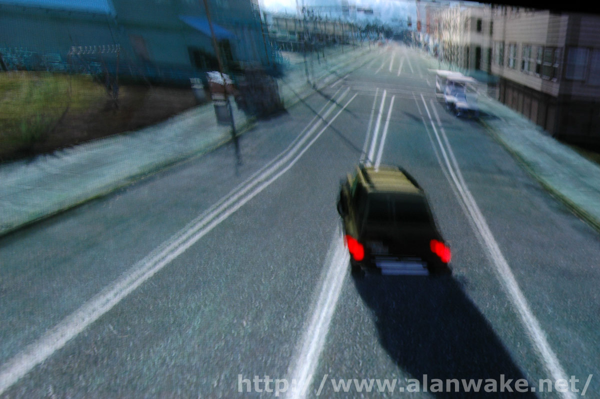 Alan driving his SUV through the main street of Bright Falls, past the Bright's Diner. Alan driving his SUV through the main street of Bright Falls, past the Bright's Diner.