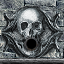 DungeonSiege-b_t_cry01_wall-skull.png