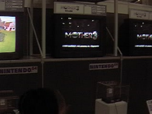 Tazmily can be seen on the left TV, with the right two displaying the title screen.