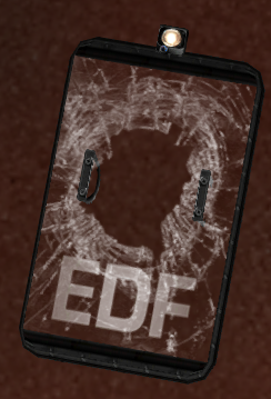 A broken Riot Shield that has been discarded.