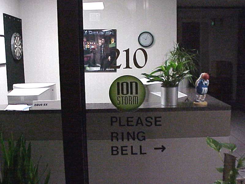 Ion Storm offices with Deus Ex beta poster.