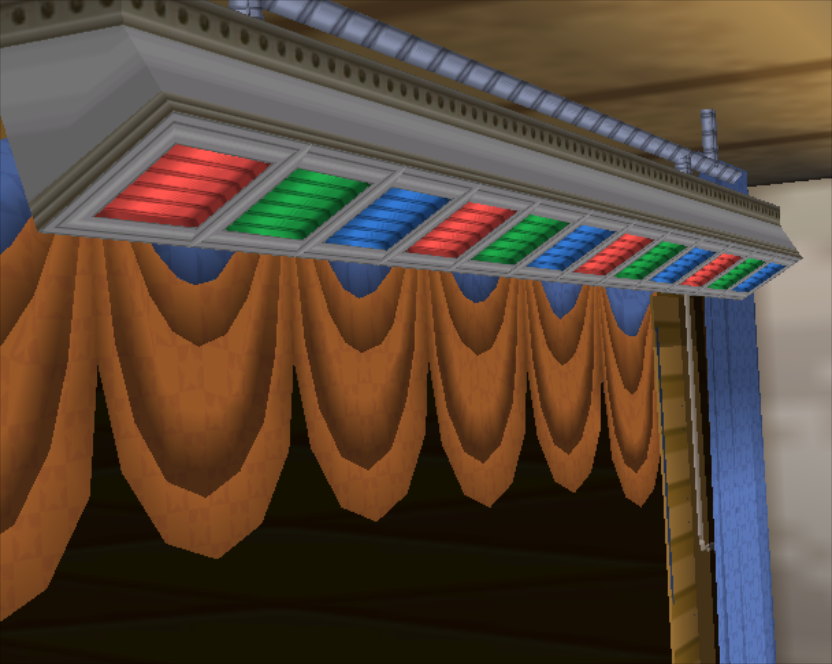 These ceiling lights are slightly above the curtains and cannot be seen. There are colored textures for each light that can be seen facing away from the audience.