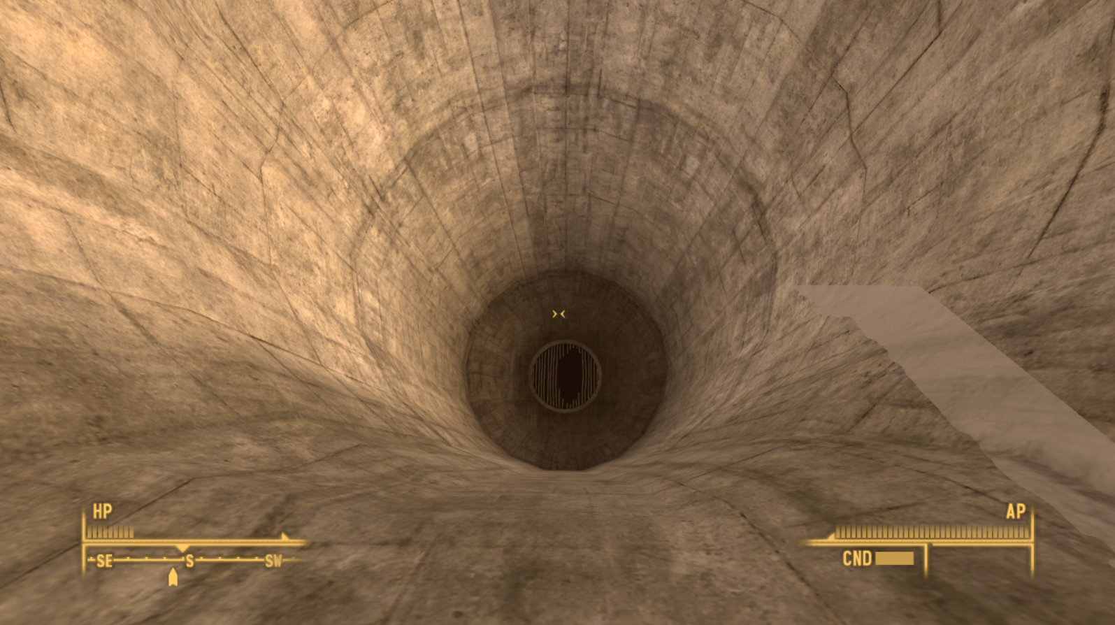A grate now functioning as a door that leads to the tunnel interior.