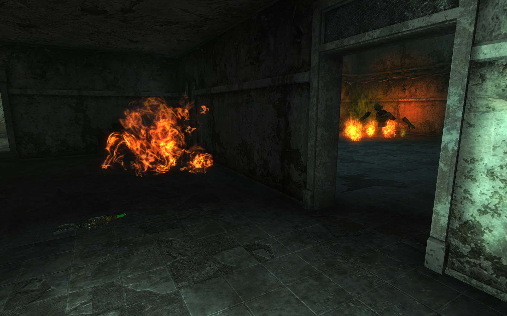 Those things in the fire are static chunks of super mutant gore.