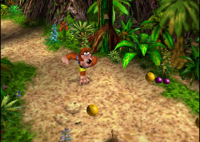 Banjo collecting fruit. The orange graphic seen here would eventually be reused in Mumbo's Mountain in the final game. Banjo collecting fruit. The orange graphic seen here would eventually be reused in Mumbo's Mountain in the final game.