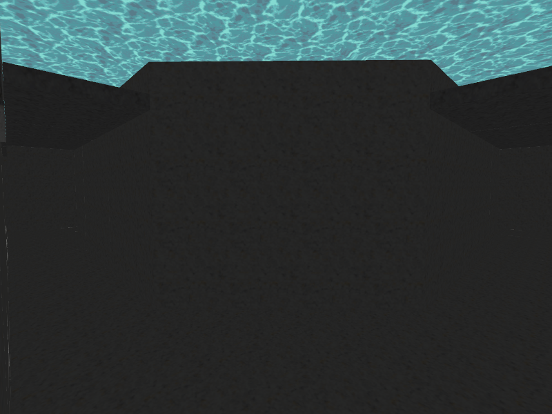 Underneath the water in the water room.