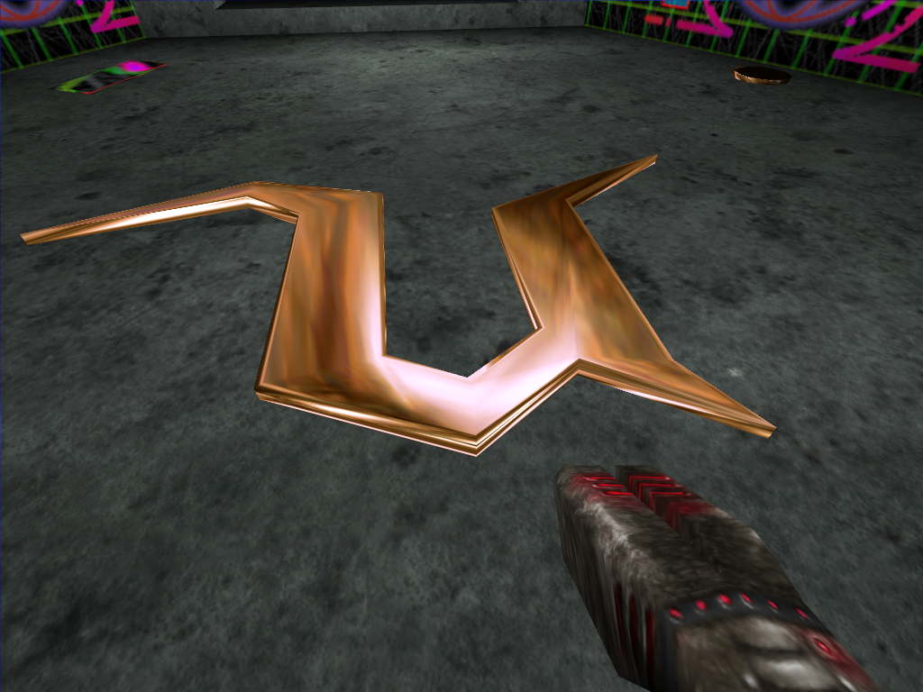 Gold U from Unreal Tournament's logo in the center of the room.