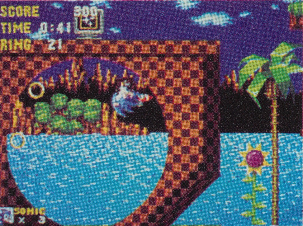 A common pre-release image of the Act 1 loop containing an invincibility monitor on the top instead of a shield.