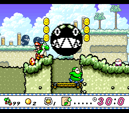 A falling Chain Chomp, about to break a yellow platform.